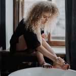 girl having pedicure