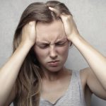 woman having a headche