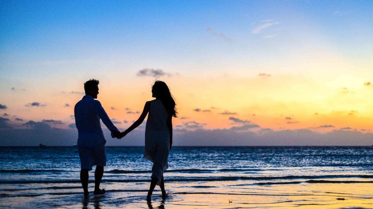 man and woman walking