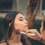 woman having her make up done