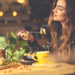 woman eating salad