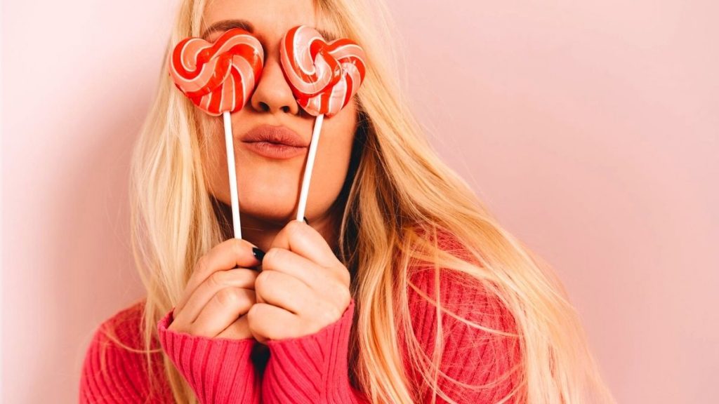 woman holding candy