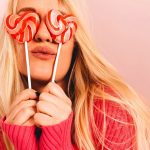 woman holding candy