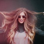 woman touching her hair
