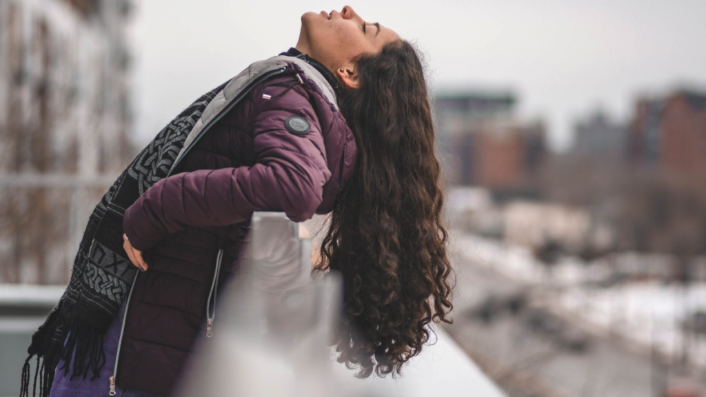 woman with long curly hair