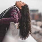 woman with long curly hair