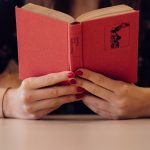 woman holding book