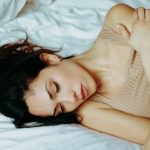 san woman on bed